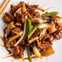 Bourbon Chicken Combo · Chicken tossed in sweet and savory bourbon sauce. Served with one egg roll and pork fried ri...