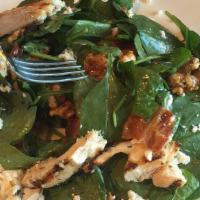 Spinach Salad · Spinach, bacon, goat cheese, candied nuts, seasonal fruit, honey cider vinaigrette.