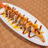 Sr17. Sunny Roll · Shrimp tempura inside, topped w. cook carbmeat and caciar and special sauce.