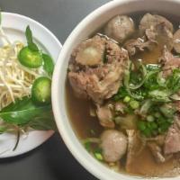 Vinh'S Special · Oxtail, filet, brisket, and meatballs. Garnished with onions and cilantro. Add Steamed Veget...