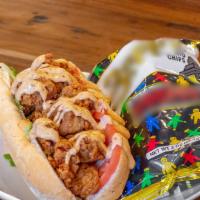Gator Po' Boy · Our famous fried gator turned into a Po' Boy!  Lettuce, tomato and remoulade with Zapps pota...
