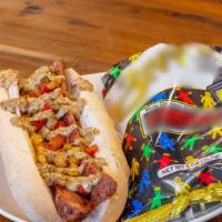 Andouille Sausage Po' Boy · Andouille Sausage link served with sautéed onions and peppers and a little shmear of our Cre...