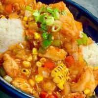 Shrimp & Chicken Creole · Cajun seasoned Chicken breast and shrimp smothered in a house made Creole sauce and served o...