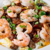 Shrimp & Grits  · House made Wiesenberger grits topped with fresh gulf shrimp, pepper and Cajun parmesan chees...
