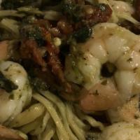 Shrimp Pasta · Sun Dried tomatoes, spinach, feta cheese, pine nuts, basil pesto, lemon, white wine, spaghet...