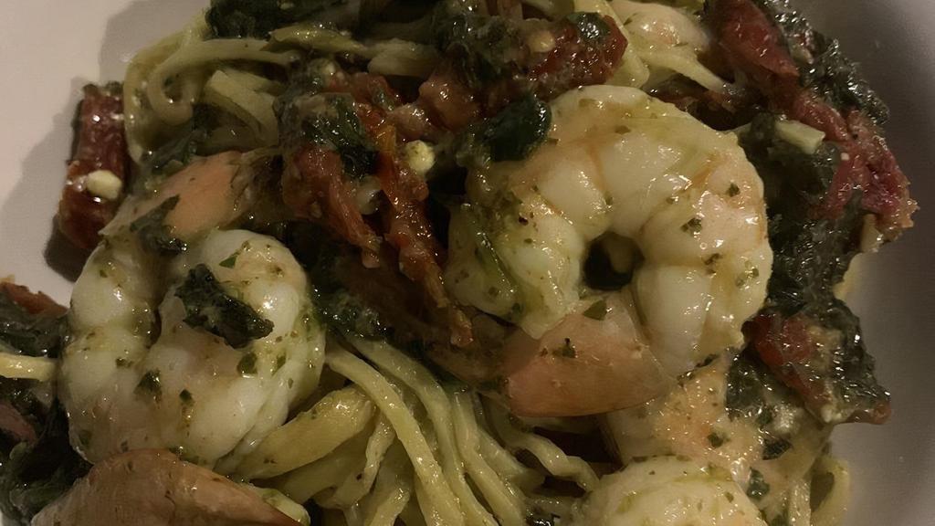 Shrimp Pasta · Sun Dried tomatoes, spinach, feta cheese, pine nuts, basil pesto, lemon, white wine, spaghetti.
