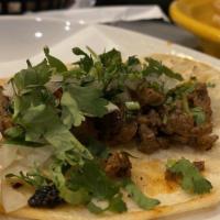 Carne Azada Taco Combo · Three folded soft corn tortillas filled with grilled steak, topped with cilantro & raw onion...