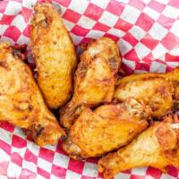 Donks Wings · The best in town! Hand-breaded or naked jumbo wings tossed in your choice of sauces. Add fri...