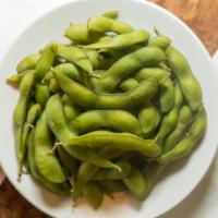 Edamame · Steamed whole soy beans topped with salt.