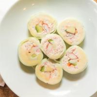 Snow Crab Naruto Roll · (8 pc.) snow crab, crabstick, avocado, naruto sauce, and smelt roe wrapped in cucumber. *no ...