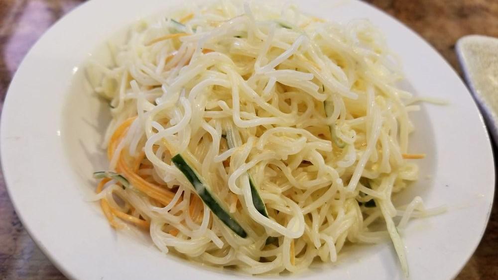 Noodle Salad · Bean thread noodles with cucumber and carrots in a creamy sauce.