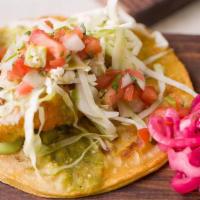 Fish Tacos · Tempura-battered fish, cabbage, Salsa verde, pico de gallo, poblano tartar sauce.