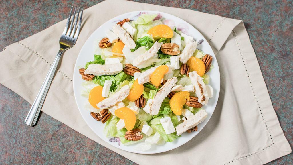 Raspberry Pecan Chicken Salad · Fresh green lettuce mix with grilled chicken, chopped pecans, mandarin oranges, crumbled Feta cheese, and raspberry vinaigrette dressing.