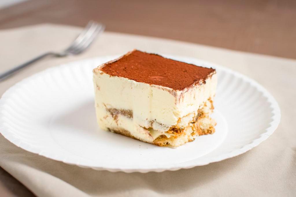 Tiramisu · Two delicate layers of sponge cake saturated with espresso coffee and marsala. Then combined with a thick, creamy layer of filling and marscapone.