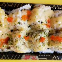 Hiro · (Shrimp tempura, fried crab, avocado, eel sauce, spicy mayo, masago).