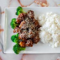 Sesame Chicken · Lightly breaded chunks of chicken deep-fried w. Sweet golden sauce and served w. Broccoli.