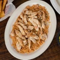 Pollo Con Arroz · A bed of rice topped with strips of grilled, chicken and white queso.