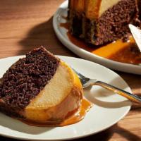 Chocoflan   **New** · Homemade mexican custard with a chocolate sponge cake base. Also know as (The impossible cake)