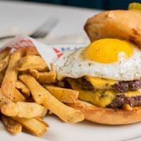 The Mocking Burger · Double cheeseburger, American cheese, charred onion, fancy sauce, butter bun.