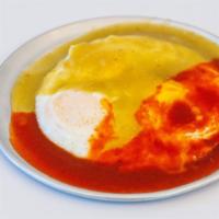 Eggs Divorciados · 2 fried eggs cook to order and topped with 2 salsas , one green and other red served with ri...
