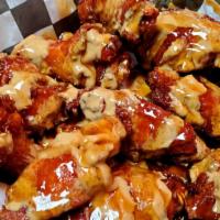 15 Spicy Peanut Butter Honey Wings · 15 Wings in our NEW tasty sauce!