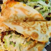 Chicken Wrap  - Choose Your Sauce · Fried chicken with your choice of  sauce wrapped up in a giant tortilla with cheese and shre...