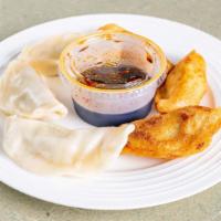 Dumplings · Savory chicken and vegetable potstickers pan-fried or steamed and served with our homemade d...