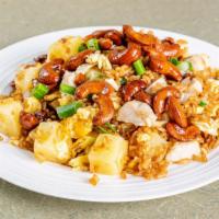 Pineapple Chicken Cashew Fried Rice · Sliced chicken breast, cashews, and pineapple stir-fried in rice with egg, and onions.