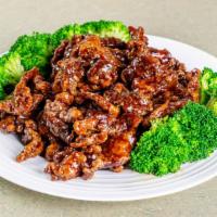 *Crispy Beef · Hot & spicy. Lightly breaded slices of steak, fried until crispy and tossed in a sweet and m...