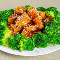 Sesame Tofu · The vegetarian version of Sesame Chicken! Large chunks of fried tofu tossed in our famous se...