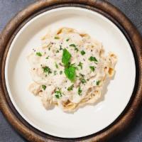 Fettuccine Alfredo · Recommended. Fettuccine pasta smothered in creamy alfredo sauce topped with mozzarella and P...