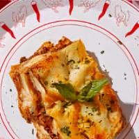 Meat Lasagna · Beef, tomato, and mozzarella over layers of tender pasta, topped with marinara sauce, and ba...