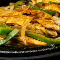 Lunch Fajitas · Lunch sized portion of a sizzling skillet with your choice of grilled chicken or steak, onio...