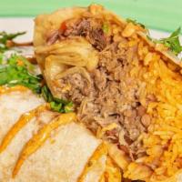 Burrito A La Parrilla · Choice of carne asada, carnitas, adobada, lengua, chicken, the pastor comes with beans, pico...