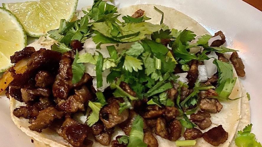 Carne Asada Taco · Steak. Grilled tacos served with cilantro and onions.