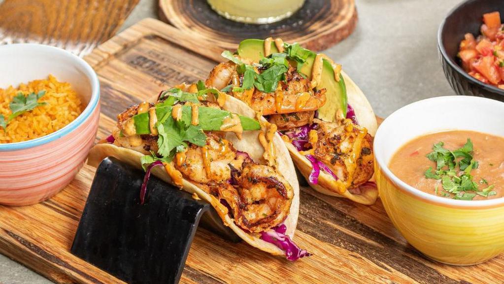 Shrimp Taco · Grilled tacos served with cilantro and onions.