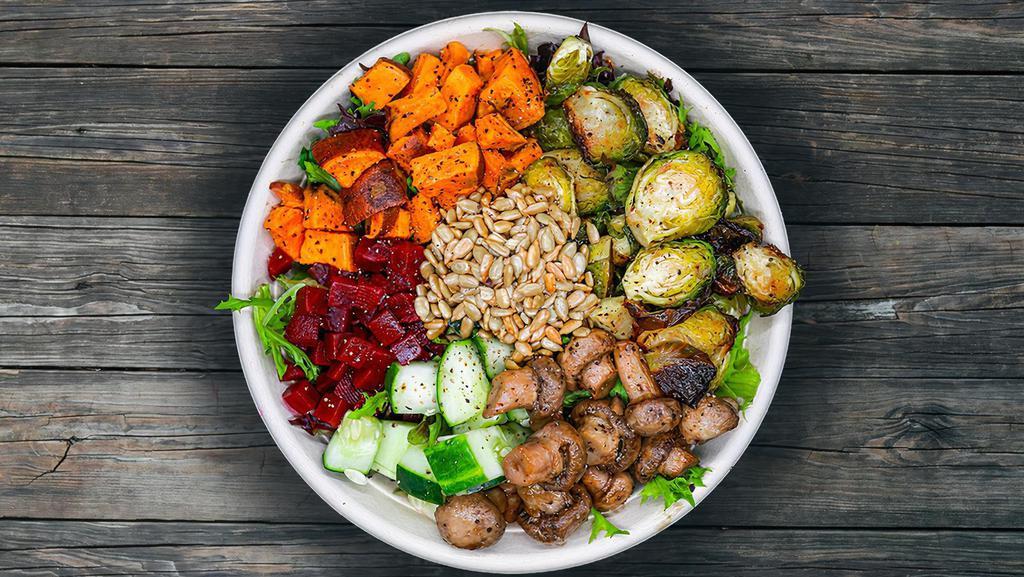 Harvest Crunch · Toasted Brussels sprouts, roasted beets, sweet potato, cucumber, crispy chick peas, mushrooms, broccoli and sunflower seeds. Suggested dressing: creamy lemon tahini or oil and vinegar. Gluten free. Vegan.