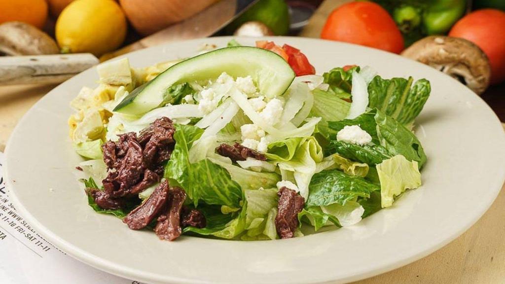 Greek · Lettuce, artichoke hearts, cucumber, onion, tomato, feta, kalamata olives.