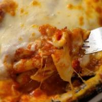 Cheesy Baked Ziti · Our take on a simple comfort food. 
We take our penne pasta, add our delicious marinara sauc...