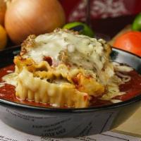 Lasagna · Our in-house made meatballs, crushed, and sausage layered with rich cheese, pasta, and marin...