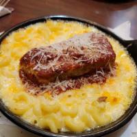 Smoked Meatloaf Mac & Cheese · A delicious blend of smoked meatloaf, consisting of beef, pork and veal, with a spicy red sa...