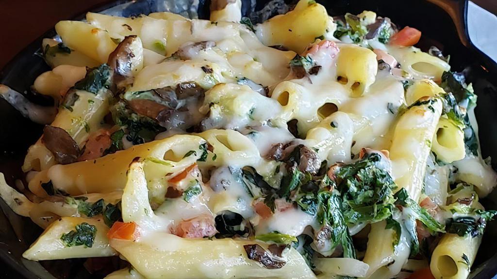 Pasta Primavera · A delicious blend of Spinach, Mushrooms, tomatoes, Onions, and Minced Garlic tossed in a light cheese sauce and topped with shredded Pecorino cheese.