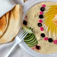 Hummus With Pita Big · Dip made from chickpeas, garlic, lemon, and sesame sauce (tahini).