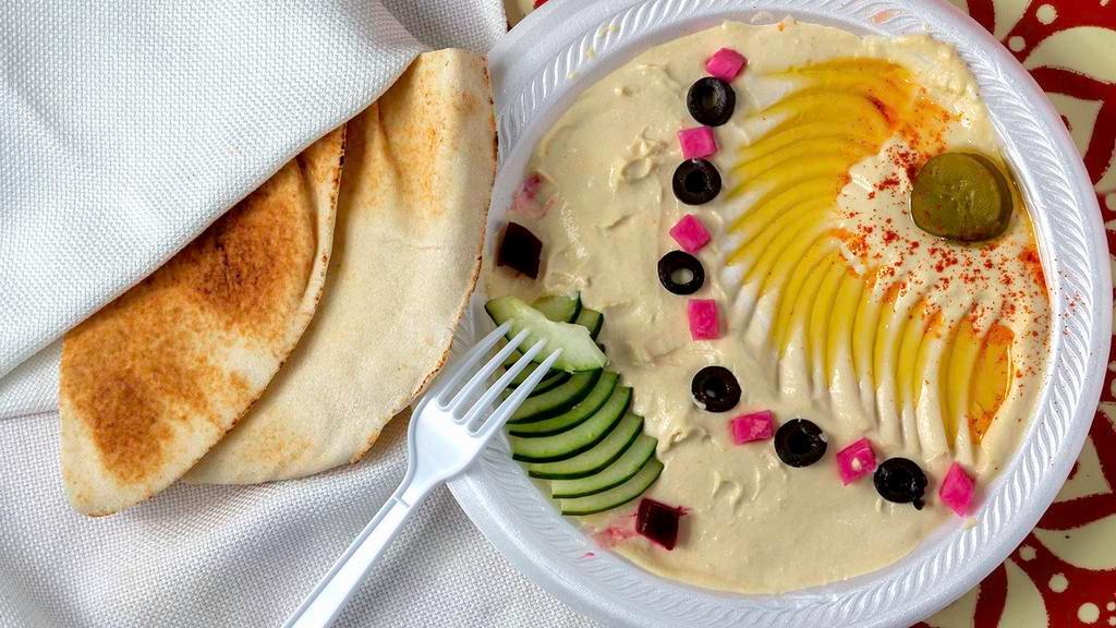 Hummus With Pita Big · Dip made from chickpeas, garlic, lemon, and sesame sauce (tahini).