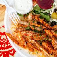 Chicken Shawarma Plate · Grilled chicken breast marinated in light spices, side of garlic sauce.