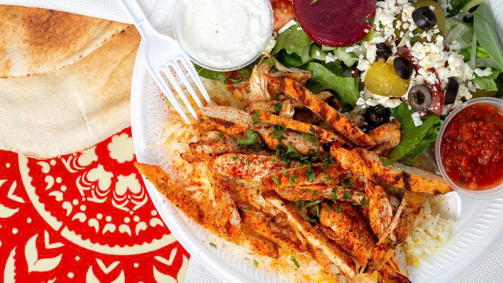 Chicken Shawarma Plate · Grilled chicken breast marinated in light spices, side of garlic sauce.