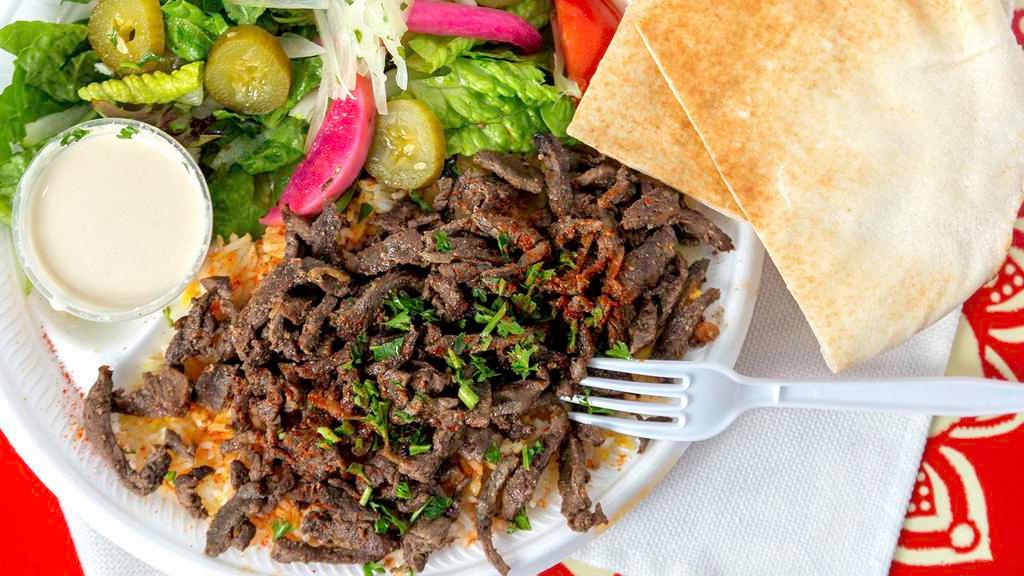 Beef Shawarma Plaate · Beef marinated in light spices. Side of garlic sauce.