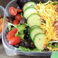 Green Salad · Spring Mix, mixed cheese, tomato, cucumber, bacon, egg