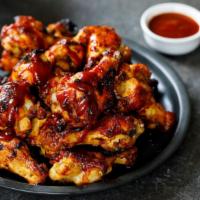 Kick In Bourbon Chicken Wings · Chef's special bourbon style chicken wings.