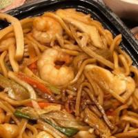 Shrimp Lo Mein · Sauteed beef with bean sprout onions chinese broccoli and rice noodle.